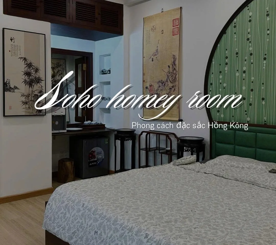The Soho room, inspired by old Hong Kong with a moon gate headboard